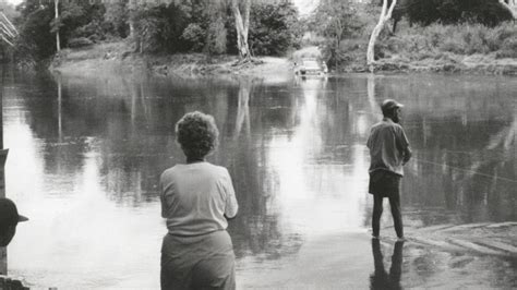 Feeding frenzy: Disturbing vision of family, including a young child .